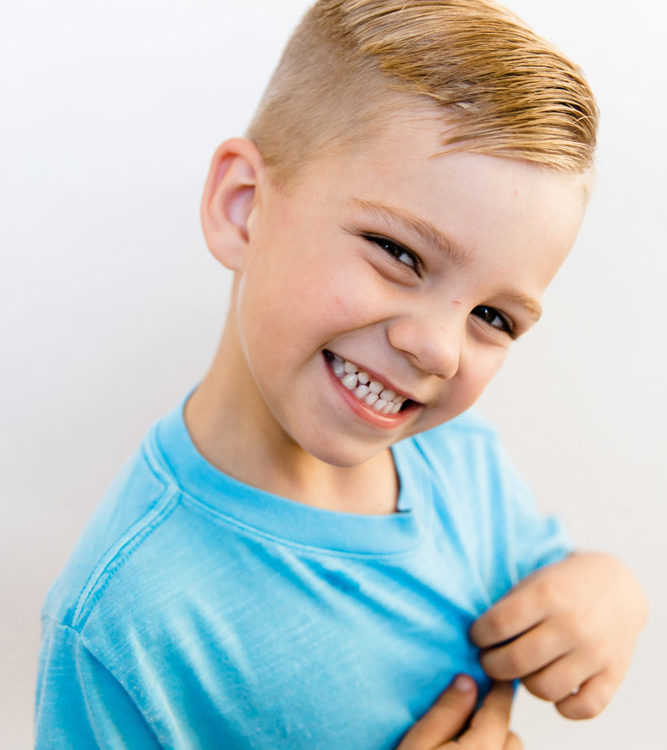 Boy smiling after dentist visit