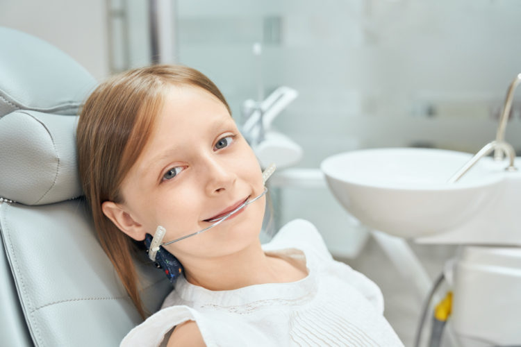 Girl in Pediatric Dentist Chair